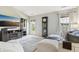 Cozy living room featuring a large television, display shelves, and comfortable seating at 7048 Tassel Meadow Dr, Indianapolis, IN 46217
