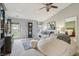 Comfortable living room with stylish furnishings, including a large sectional sofa and entertainment center at 7048 Tassel Meadow Dr, Indianapolis, IN 46217