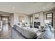 Spacious living room with fireplace, comfortable seating, and an open layout at 7331 Deerberg Dr, Indianapolis, IN 46259