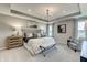 This is a stunning main bedroom with tray ceiling and natural light at 7331 Deerberg Dr, Indianapolis, IN 46259