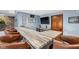 Finished basement bar with counter seating and countertop at 7424 Campfire Run, Indianapolis, IN 46236