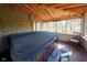 Enclosed patio with hot tub, perfect for private relaxation space with natural light at 7424 Campfire Run, Indianapolis, IN 46236
