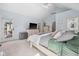 Large main bedroom featuring an ensuite bathroom, and outside access to the exterior at 7424 Campfire Run, Indianapolis, IN 46236