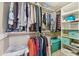 Walk-in closet with shelving and clothing rods for maximum storage and organization at 7450 Deville Ct, Indianapolis, IN 46256