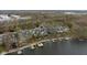 Aerial view of waterfront homes with docks and beautiful scenic water access at 7640 Bay Shore Dr, Indianapolis, IN 46240