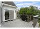 Backyard deck with sliding door access, a grill, and outdoor space for relaxing at 7640 Bay Shore Dr, Indianapolis, IN 46240
