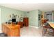 Home office with beautiful wood desk and cabinets, plenty of workspace and natural light at 7640 Bay Shore Dr, Indianapolis, IN 46240
