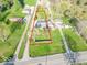 Aerial view of property, showcasing lush greenery and surrounding homes at 7748 S State Road 39, Clayton, IN 46118