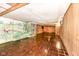 Spacious finished basement with a mural and wood paneling at 80 S Richland Ave, Carmel, IN 46032