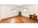 Bedroom with two windows, wood floors and rustic furniture at 80 S Richland Ave, Carmel, IN 46032