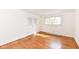 Bedroom featuring hardwood floors, one window, and a closet at 80 S Richland Ave, Carmel, IN 46032