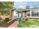 Inviting front porch with a small seating area and a decorative wreath on the door at 80 S Richland Ave, Carmel, IN 46032