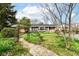 Charming brick home with a landscaped front yard and brick walkway leading to the entrance at 80 S Richland Ave, Carmel, IN 46032
