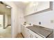 Practical laundry room with white cabinets and a sink at 80 S Richland Ave, Carmel, IN 46032