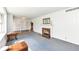 Spacious and well-lit living room featuring a fireplace and large windows at 80 S Richland Ave, Carmel, IN 46032