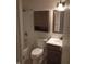 Clean bathroom featuring a shower-tub combo, vanity with storage, and medicine cabinet mirror at 8106 Captain Dr, Avon, IN 46123