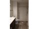 Bathroom with a dark wood vanity and a stand-up shower at 8106 Captain Dr, Avon, IN 46123