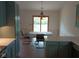 Bright dining area featuring wood floors and sliding glass doors to the backyard at 8106 Captain Dr, Avon, IN 46123