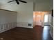 Open-concept living room features hardwood floors, neutral paint, and wainscoting at 8106 Captain Dr, Avon, IN 46123