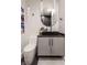 Modern bathroom features a vanity with unique mirror and countertop sink at 8155 Hunt Club Rd, Zionsville, IN 46077