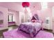 Whimsical bedroom featuring an elaborate canopy bed, large window and a plush carpet at 8155 Hunt Club Rd, Zionsville, IN 46077