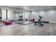 Home gym with mirrored wall and exercise equipment at 8155 Hunt Club Rd, Zionsville, IN 46077