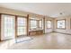 Spacious living room with built-in bench seating below the window, perfect for relaxing and enjoying the natural light at 8155 Hunt Club Rd, Zionsville, IN 46077