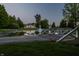 Beautiful property featuring a serene pond and fountain, accessible via a charming bridge at 8155 Hunt Club Rd, Zionsville, IN 46077