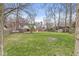 Massive and well-maintained backyard with mature trees provides plenty of privacy at 8715 Kensington Dr, Noblesville, IN 46060