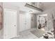 Bright foyer with tiled floors, double doors, and staircase, creating an inviting and open entryway at 8715 Kensington Dr, Noblesville, IN 46060