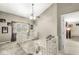 Upstairs hallway featuring decorative railings, neutral walls, and an open doorway at 8715 Kensington Dr, Noblesville, IN 46060