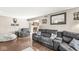 Spacious living room with hardwood floors, comfortable seating, and stylish decor at 8715 Kensington Dr, Noblesville, IN 46060