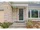 Charming front door entrance with stone and decorative metal accents at 928 Forest Blvd N Dr, Indianapolis, IN 46240