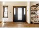 Inviting foyer with beautiful hardwood floors and natural light at 933 Tecumseh St, Indianapolis, IN 46201