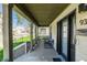 Comfortable front porch with chairs, offering an outdoor seating area at 933 Tecumseh St, Indianapolis, IN 46201