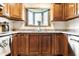 Bright kitchen featuring a window above the sink and stainless steel appliances at 933 Tecumseh St, Indianapolis, IN 46201