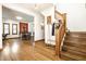 Welcoming staircase leading to the upper level, showcasing hardwood flooring and open layout at 933 Tecumseh St, Indianapolis, IN 46201
