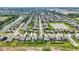 A high aerial view shows a well-planned community featuring ponds, green spaces, and neatly arranged homes at 950 Redwood Dr, Franklin, IN 46131
