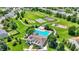 Aerial view of the community pool and recreation area, surrounded by lush greenery and mature trees at 950 Redwood Dr, Franklin, IN 46131