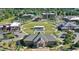 Aerial view of community with green spaces and modern buildings, showcasing campus-like environment at 10235 Normandy Way, Fishers, IN 46040