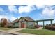 Charming amenity center with stone facade, well-maintained landscaping, and inviting entrance at 10235 Normandy Way, Fishers, IN 46040