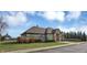 Attractive amenity center featuring a stone facade, ample parking, and manicured landscaping at 10235 Normandy Way, Fishers, IN 46040