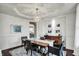 Elegant dining room showcasing a modern chandelier and sophisticated decor at 10235 Normandy Way, Fishers, IN 46040