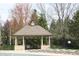Picturesque gazebo overlooking the pool, complete with seating and ample lounge chairs at 10235 Normandy Way, Fishers, IN 46040