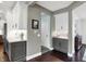 Stylish kitchen area with modern cabinetry, marble countertops, and sleek appliances at 10235 Normandy Way, Fishers, IN 46040