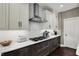Close up of the kitchen featuring stainless steel appliances, tile backsplash and quartz counters at 10235 Normandy Way, Fishers, IN 46040