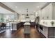 Spacious kitchen featuring stainless steel appliances, a center island, and two-tone cabinets at 10235 Normandy Way, Fishers, IN 46040