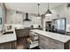 Contemporary kitchen design with spacious island, stainless steel appliances, and custom cabinetry at 10235 Normandy Way, Fishers, IN 46040