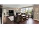 Spacious living room with a fireplace, large windows, and modern decor at 10235 Normandy Way, Fishers, IN 46040