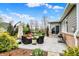 Cozy patio with comfortable seating, a grill, and a well-maintained area ideal for outdoor entertaining at 10235 Normandy Way, Fishers, IN 46040